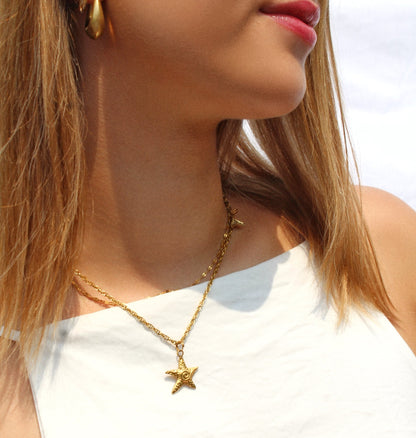 Swirling Star Charm